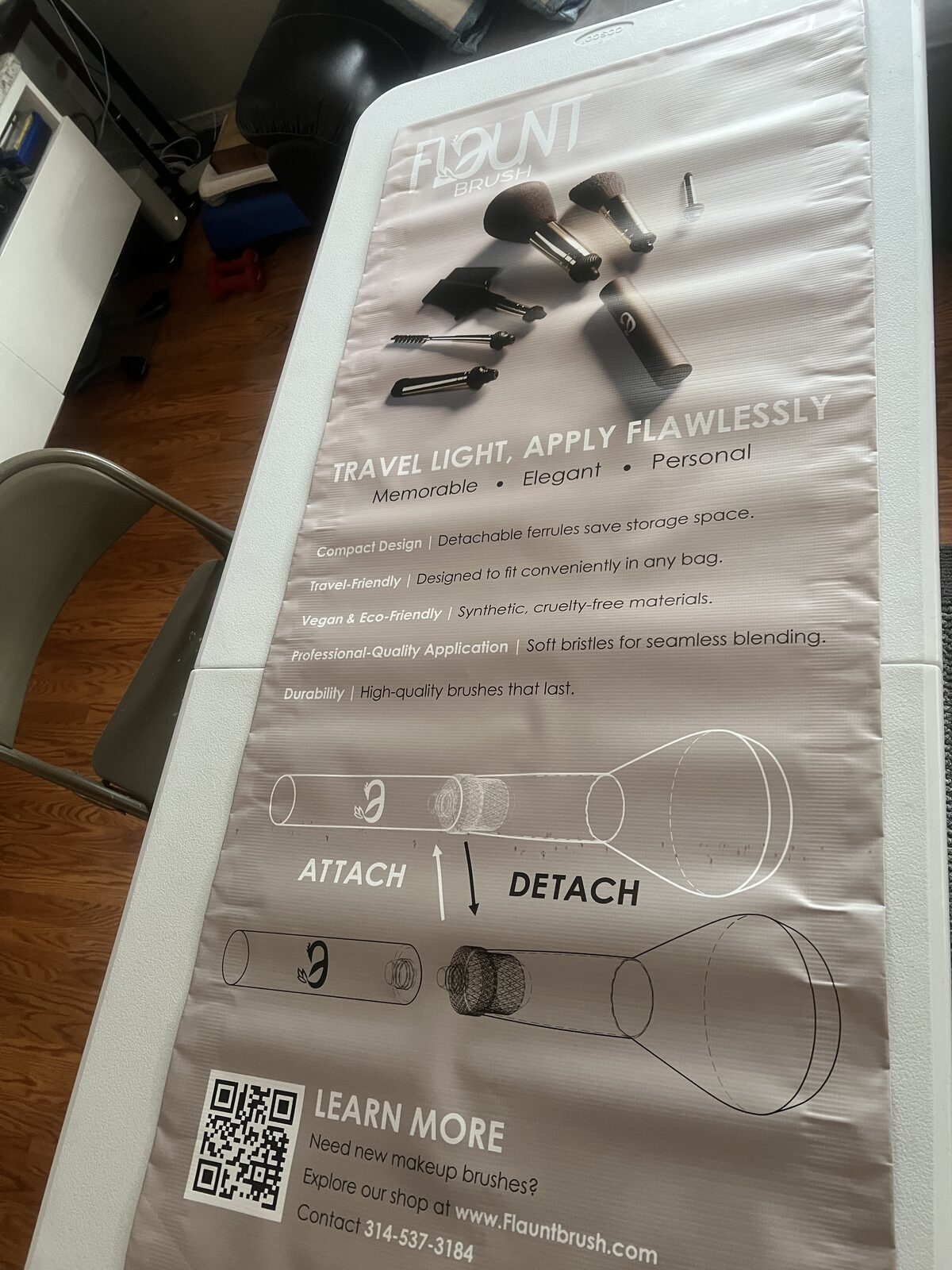FlauntBrush retractable banner — attach/detach instructions with a QR code.